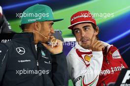 (L to R): Lewis Hamilton (GBR) Mercedes AMG F1 and Fernando Alonso (ESP) Ferrari in the FIA Press Conference. 17.04.2014. Formula 1 World Championship, Rd 4, Chinese Grand Prix, Shanghai, China, Preparation Day.