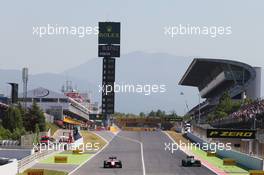 (L to R): Max Chilton (GBR) Marussia F1 Team MR03 and Marcus Ericsson (SWE) Caterham CT05. 09.05.2014. Formula 1 World Championship, Rd 5, Spanish Grand Prix, Barcelona, Spain, Practice Day.