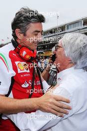 (L to R): Marco Mattiacci (ITA) Ferrari Team Principal with Bernie Ecclestone (GBR) on the grid. 11.05.2014. Formula 1 World Championship, Rd 5, Spanish Grand Prix, Barcelona, Spain, Race Day.