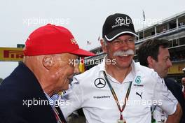 (L to R): Niki Lauda (AUT) Mercedes Non-Executive Chairman with Dr. Dieter Zetsche (GER) Daimler AG CEO on the grid. 11.05.2014. Formula 1 World Championship, Rd 5, Spanish Grand Prix, Barcelona, Spain, Race Day.