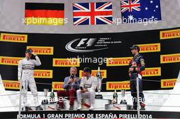 The podium (L to R): Nico Rosberg (GER) Mercedes AMG F1, second; Eddie Jordan (IRE) BBC Television Pundit; Lewis Hamilton (GBR) Mercedes AMG F1, race winner; Daniel Ricciardo (AUS) Red Bull Racing, third. 11.05.2014. Formula 1 World Championship, Rd 5, Spanish Grand Prix, Barcelona, Spain, Race Day.