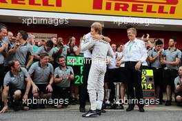 Nico Rosberg (GER) Mercedes AMG F1 celebrates his second position with Dr. Dieter Zetsche (GER) Daimler AG CEO and the team. 11.05.2014. Formula 1 World Championship, Rd 5, Spanish Grand Prix, Barcelona, Spain, Race Day.