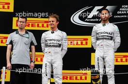 (L to R): Mike Elliot (GBR) Mercedes AMG F1 Head of Aero with Nico Rosberg (GER) Mercedes AMG F1 and race winner Lewis Hamilton (GBR) Mercedes AMG F1. 11.05.2014. Formula 1 World Championship, Rd 5, Spanish Grand Prix, Barcelona, Spain, Race Day.