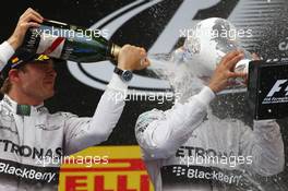 2nd place Nico Rosberg (GER) Mercedes AMG F1 with 1st place Lewis Hamilton (GBR) Mercedes AMG F1. 11.05.2014. Formula 1 World Championship, Rd 5, Spanish Grand Prix, Barcelona, Spain, Race Day.