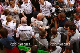 Race winner Lewis Hamilton (GBR) Mercedes AMG F1 and second placed Nico Rosberg (GER) Mercedes AMG F1 celebrate with the team. 11.05.2014. Formula 1 World Championship, Rd 5, Spanish Grand Prix, Barcelona, Spain, Race Day.