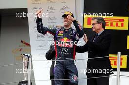 Daniel Ricciardo (AUS) Red Bull Racing celebrates his third position on the podium. 11.05.2014. Formula 1 World Championship, Rd 5, Spanish Grand Prix, Barcelona, Spain, Race Day.