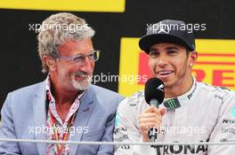 The podium (L to R): Eddie Jordan (IRE) BBC Television Pundit with race winner Lewis Hamilton (GBR) Mercedes AMG F1. 11.05.2014. Formula 1 World Championship, Rd 5, Spanish Grand Prix, Barcelona, Spain, Race Day.