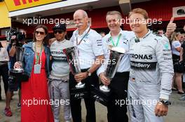 Race winner Lewis Hamilton (GBR) Mercedes AMG F1 and second placed team mate Nico Rosberg (GER) Mercedes AMG F1 celebrate with Dr. Dieter Zetsche (GER) Daimler AG CEO and the team. 11.05.2014. Formula 1 World Championship, Rd 5, Spanish Grand Prix, Barcelona, Spain, Race Day.