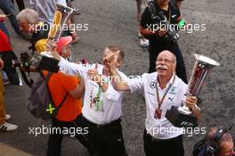 Dr. Dieter Zetsche (GER) Daimler AG CEO (Right) celebrates a 1-2 finish for Mercedes AMG F1. 11.05.2014. Formula 1 World Championship, Rd 5, Spanish Grand Prix, Barcelona, Spain, Race Day.