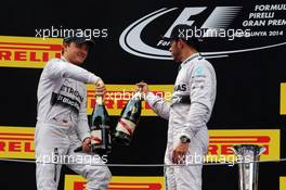 (L to R): second placed Nico Rosberg (GER) Mercedes AMG F1 celebrates with team mate and race winner Lewis Hamilton (GBR) Mercedes AMG F1. 11.05.2014. Formula 1 World Championship, Rd 5, Spanish Grand Prix, Barcelona, Spain, Race Day.