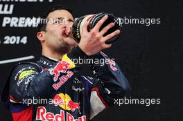 Daniel Ricciardo (AUS) Red Bull Racing celebrates his third position with the champagne on the podium. 11.05.2014. Formula 1 World Championship, Rd 5, Spanish Grand Prix, Barcelona, Spain, Race Day.