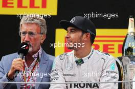 The podium (L to R): Eddie Jordan (IRE) BBC Television Pundit with race winner Lewis Hamilton (GBR) Mercedes AMG F1. 11.05.2014. Formula 1 World Championship, Rd 5, Spanish Grand Prix, Barcelona, Spain, Race Day.