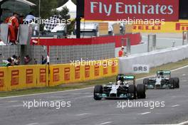aLewis Hamilton (GBR), Mercedes AMG F1 Team and Nico Rosberg (GER), Mercedes AMG F1 Team  11.05.2014. Formula 1 World Championship, Rd 5, Spanish Grand Prix, Barcelona, Spain, Race Day.