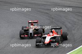Jules Bianchi (FRA) Marussia F1 Team MR03 leads Pastor Maldonado (VEN) Lotus F1 E21. 11.05.2014. Formula 1 World Championship, Rd 5, Spanish Grand Prix, Barcelona, Spain, Race Day.