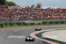 Lewis Hamilton (GBR) Mercedes AMG F1 W05 leads team mate Nico Rosberg (GER) Mercedes AMG F1 W05. 11.05.2014. Formula 1 World Championship, Rd 5, Spanish Grand Prix, Barcelona, Spain, Race Day.