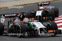 Nico Hulkenberg (GER) Sahara Force India F1 VJM07 leads team mate Sergio Perez (MEX) Sahara Force India F1 VJM07. 11.05.2014. Formula 1 World Championship, Rd 5, Spanish Grand Prix, Barcelona, Spain, Race Day.