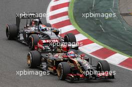 Romain Grosjean (FRA) Lotus F1 E22 leads Adrian Sutil (GER) Sauber C33. 11.05.2014. Formula 1 World Championship, Rd 5, Spanish Grand Prix, Barcelona, Spain, Race Day.