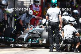 Lewis Hamilton (GBR) Mercedes AMG F1 W05 makes a pit stop. 10.05.2014. Formula 1 World Championship, Rd 5, Spanish Grand Prix, Barcelona, Spain, Qualifying Day.