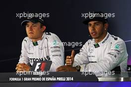 The FIA Press Conference (L to R): Nico Rosberg (GER) Mercedes AMG F1 with team mate Lewis Hamilton (GBR) Mercedes AMG F1. 10.05.2014. Formula 1 World Championship, Rd 5, Spanish Grand Prix, Barcelona, Spain, Qualifying Day.