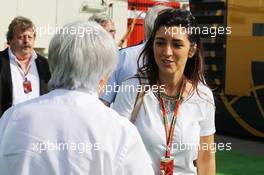 Bernie Ecclestone (GBR) with wife Fabiana Flosi (BRA). 10.05.2014. Formula 1 World Championship, Rd 5, Spanish Grand Prix, Barcelona, Spain, Qualifying Day.