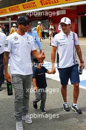 Lewis Hamilton (GBR) Mercedes AMG F1 (Left) with Felipe Massa (BRA) Williams and his son Felipinho Massa (BRA) on the drivers parade. 11.05.2014. Formula 1 World Championship, Rd 5, Spanish Grand Prix, Barcelona, Spain, Race Day.