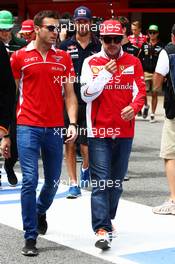 (L to R): Jules Bianchi (FRA) Marussia F1 Team with Fernando Alonso (ESP) Ferrari on the drivers parade. 11.05.2014. Formula 1 World Championship, Rd 5, Spanish Grand Prix, Barcelona, Spain, Race Day.