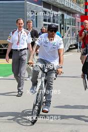Lewis Hamilton (GBR) Mercedes AMG F1 on his bicycle in the paddock. 11.05.2014. Formula 1 World Championship, Rd 5, Spanish Grand Prix, Barcelona, Spain, Race Day.