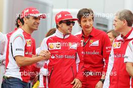 (L to R): Marc Gene (ESP) Ferrari Test Driver with Fernando Alonso (ESP) Ferrari. 11.05.2014. Formula 1 World Championship, Rd 5, Spanish Grand Prix, Barcelona, Spain, Race Day.