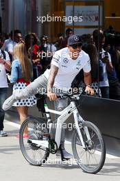 Lewis Hamilton (GBR) Mercedes AMG F1 on his bicycle in the paddock. 11.05.2014. Formula 1 World Championship, Rd 5, Spanish Grand Prix, Barcelona, Spain, Race Day.