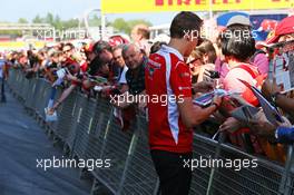 Max Chilton (GBR) Marussia F1 Team signs autographs for the fans. 08.05.2014. Formula 1 World Championship, Rd 5, Spanish Grand Prix, Barcelona, Spain, Preparation Day.