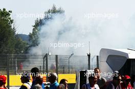 Smoke opposite the pits. 08.05.2014. Formula 1 World Championship, Rd 5, Spanish Grand Prix, Barcelona, Spain, Preparation Day.
