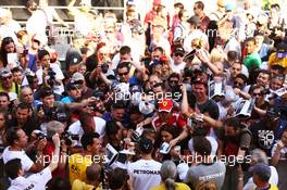 Lewis Hamilton (GBR) Mercedes AMG F1 with fans in the pits. 08.05.2014. Formula 1 World Championship, Rd 5, Spanish Grand Prix, Barcelona, Spain, Preparation Day.