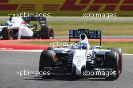 Felipe Massa (BRA) Williams FW36 leads Susie Wolff (GBR) Williams FW36 Development Driver. 04.07.2014. Formula 1 World Championship, Rd 9, British Grand Prix, Silverstone, England, Practice Day.