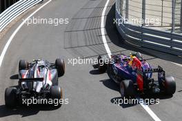 (L to R): Esteban Gutierrez (MEX) Sauber C33 with Daniel Ricciardo (AUS) Red Bull Racing RB10. 04.07.2014. Formula 1 World Championship, Rd 9, British Grand Prix, Silverstone, England, Practice Day.