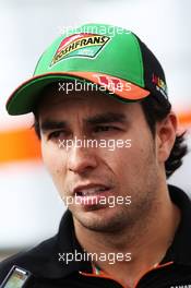 Sergio Perez (MEX) Sahara Force India F1 with the media. 04.07.2014. Formula 1 World Championship, Rd 9, British Grand Prix, Silverstone, England, Practice Day.