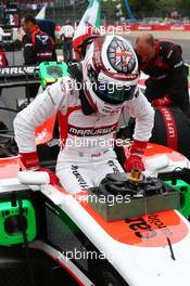 Max Chilton (GBR) Marussia F1 Team MR03 on the grid. 06.07.2014. Formula 1 World Championship, Rd 9, British Grand Prix, Silverstone, England, Race Day.