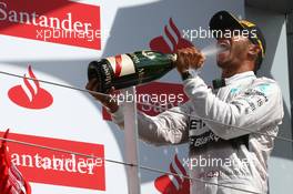 1st place Lewis Hamilton (GBR) Mercedes AMG F1. 06.07.2014. Formula 1 World Championship, Rd 9, British Grand Prix, Silverstone, England, Race Day.