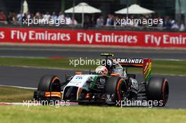 Sergio Perez (MEX) Sahara Force India F1 VJM07. 06.07.2014. Formula 1 World Championship, Rd 9, British Grand Prix, Silverstone, England, Race Day.