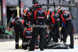 Marussia F1 Team mechanics during pitstop 06.07.2014. Formula 1 World Championship, Rd 9, British Grand Prix, Silverstone, England, Race Day.