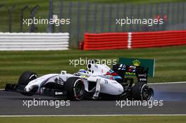 Felipe Massa (BRA) Williams FW36 with a damaged rear suspension and wheel at the start of the race. 06.07.2014. Formula 1 World Championship, Rd 9, British Grand Prix, Silverstone, England, Race Day.