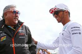 (L to R): Dr. Vijay Mallya (IND) Sahara Force India F1 Team Owner with Lewis Hamilton (GBR) Mercedes AMG F1. 05.07.2014. Formula 1 World Championship, Rd 9, British Grand Prix, Silverstone, England, Qualifying Day.