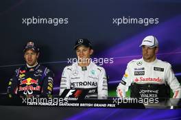 The post qualifying FIA Press Conference (L to R): Sebastian Vettel (GER) Red Bull Racing, second; Nico Rosberg (GER) Mercedes AMG F1, pole position; Jenson Button (GBR) McLaren, third. 05.07.2014. Formula 1 World Championship, Rd 9, British Grand Prix, Silverstone, England, Qualifying Day.