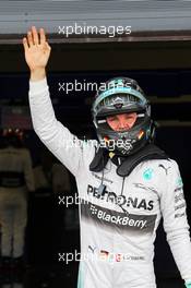 Nico Rosberg (GER) Mercedes AMG F1 celebrates his pole position in parc ferme. 05.07.2014. Formula 1 World Championship, Rd 9, British Grand Prix, Silverstone, England, Qualifying Day.