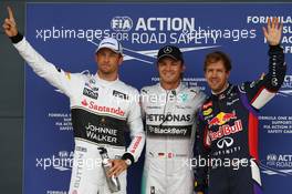 Pole Position for Nico Rosberg (GER) Mercedes AMG F1 W05, 2nd for Sebastian Vettel (GER) Red Bull Racing and 3rd for Jenson Button (GBR) McLaren MP4-29. 05.07.2014. Formula 1 World Championship, Rd 9, British Grand Prix, Silverstone, England, Qualifying Day.