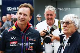 (L to R): Christian Horner (GBR) Red Bull Racing Team Principal with Bernie Ecclestone (GBR). 05.07.2014. Formula 1 World Championship, Rd 9, British Grand Prix, Silverstone, England, Qualifying Day.