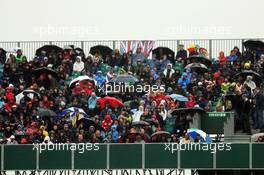 Fans in the grandstand. 05.07.2014. Formula 1 World Championship, Rd 9, British Grand Prix, Silverstone, England, Qualifying Day.