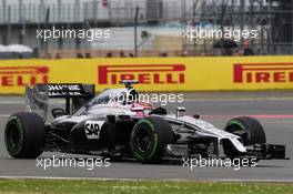 Jenson Button (GBR) McLaren MP4-29. 05.07.2014. Formula 1 World Championship, Rd 9, British Grand Prix, Silverstone, England, Qualifying Day.