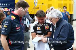(L to R): Christian Horner (GBR) Red Bull Racing Team Principal with Bernie Ecclestone (GBR). 05.07.2014. Formula 1 World Championship, Rd 9, British Grand Prix, Silverstone, England, Qualifying Day.