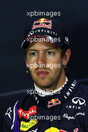 Second placed Sebastian Vettel (GER) Red Bull Racing in the FIA Press Conference. 05.07.2014. Formula 1 World Championship, Rd 9, British Grand Prix, Silverstone, England, Qualifying Day.