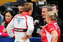 Max Chilton (GBR) Marussia F1 Team with Craig Slater (GBR) Sky F1 Reporter. 05.07.2014. Formula 1 World Championship, Rd 9, British Grand Prix, Silverstone, England, Qualifying Day.